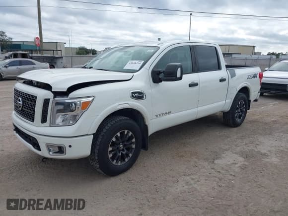 ✅ 2017 Nissan Titan SV • VIN: 1N6AA1E53HN537792 • Lot: 43848214. Listed on IAAI with 157,659 mi. Free auction sales archive from the USA and detailed vehicle history report at DreamBid. Image 2.