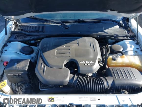 ✅ 2014 Dodge Challenger SXT • VIN: 2C3CDYAG0EH101929 • Lot: 41297567. Wystawiony na IAAI z przebiegiem 117 413 mil. Bezpłatny archiwum sprzedaży aukcyjnych z USA i szczegółowy raport historii pojazdu na DreamBid. Zdjęcie 10.