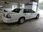 ✅ 2003 Ford Crown Victoria LX • VIN: 2FAFP74W23X134274 • Lot: 73295754. Listed on Copart with 212,581 mi. Free auction sales archive from the USA and detailed vehicle history report at DreamBid. Image 3.