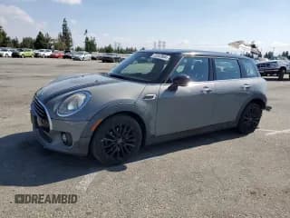✅ 2017 MINI Clubman Cooper • VIN: WMWLN5C50H2E32543 • Lot: 72557864. Listed on Copart with 89,374 mi. Free auction sales archive from the USA and detailed vehicle history report at DreamBid. Image 1.
