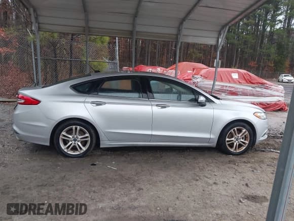 ✅ 2018 Ford Fusion SE • VIN: 3FA6P0H70JR179414 • Лот: 43877600. Опубликован ранее на IAAI с пробегом 153 151 миль. Бесплатный доступ к архиву аукционных продаж из США и подробный отчёт об истории автомобиля на DreamBid. Изображение 13.