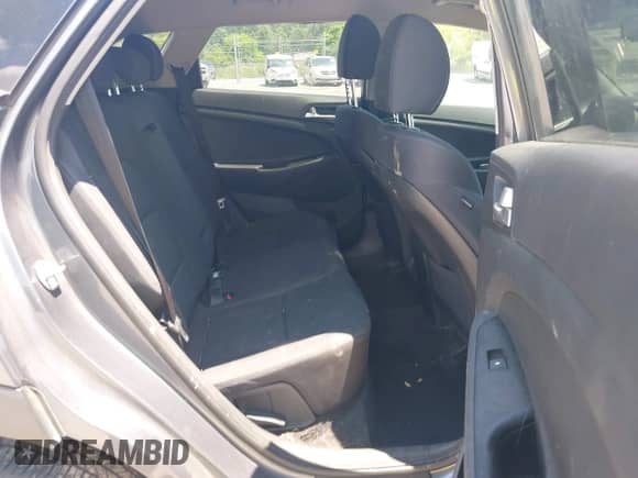 2019 Hyundai Tucson Value with VIN KM8J33A46KU052965, listed as a IAAI auction lot 42662016 with 115,861 mi miles and . Bid and sale history available at DreamBid. Image 8.