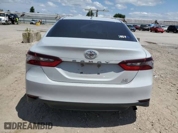 2022 Toyota Camry LE с VIN 4T1R11BK7NU055288, выставлен на аукционе Copart как лот 67012075 с пробегом 106 728 миль миль и Списание • Salvage title. История ставок и продаж доступна на DreamBid. Изображение 6.
