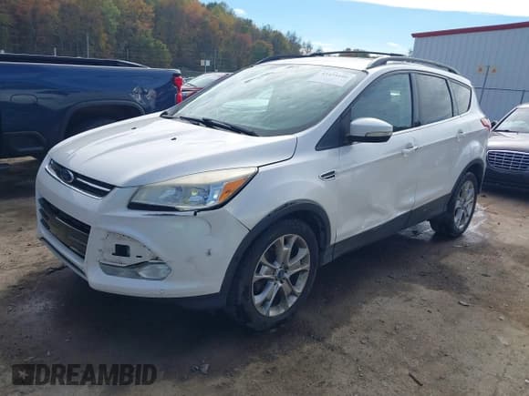 ✅ 2013 Ford Escape SEL • VIN: 1FMCU9H9XDUB07740 • Lot: 43454106. Listed on IAAI with 112,385 mi. Free auction sales archive from the USA and detailed vehicle history report at DreamBid. Image 2.