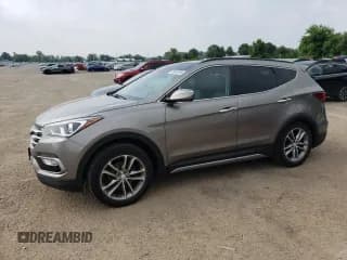 ✅ 2017 Hyundai Santa Fe 2.0T • VIN: 5XYZUDLA1HG403885 • Лот: 65052585. Опубликован ранее на Copart с пробегом 172 471 миль. Бесплатный доступ к архиву аукционных продаж из США и подробный отчёт об истории автомобиля на DreamBid. Изображение 1.