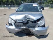 ✅ 2016 Subaru Forester Touring • VIN: JF2SJAXC4GH564016 • Lot: 42408444. Listed on IAAI with 34,506 mi. Free auction sales archive from the USA and detailed vehicle history report at DreamBid. Image 6.