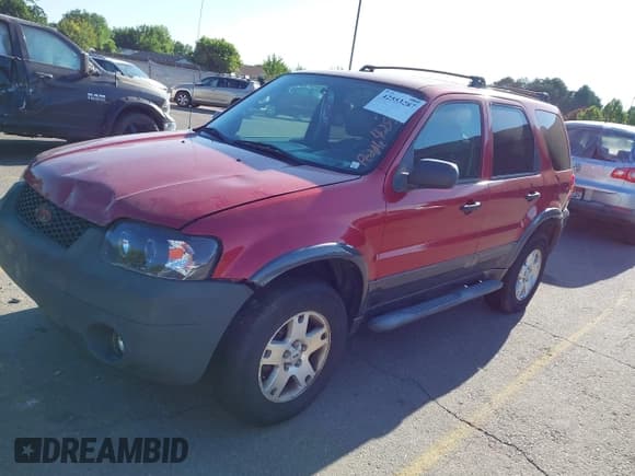 ✅ 2006 Ford Escape XLT • VIN: 1FMYU03156KB19294 • Lot: 42553287. Listed on IAAI with 128,755 mi. Free auction sales archive from the USA and detailed vehicle history report at DreamBid. Image 2.