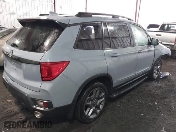 ✅ 2022 Honda Passport EX-L • VIN: 5FNYF7H52NB000679 • Lot: 41449757. Listed on IAAI with 38,672 mi. Free auction sales archive from the USA and detailed vehicle history report at DreamBid. Image 4.