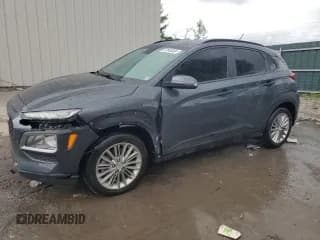 ✅ 2019 Hyundai Kona SEL • VIN: KM8K2CAA4KU323292 • Лот: 57544824. Опубликован ранее на Copart с пробегом 76 729 миль. Бесплатный доступ к архиву аукционных продаж из США и подробный отчёт об истории автомобиля на DreamBid. Изображение 1.