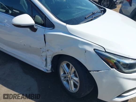 ✅ 2017 Chevrolet Cruze LT • VIN: 1G1BE5SMXH7228123 • Lot: 43396571. Listed on IAAI with 66,224 mi. Free auction sales archive from the USA and detailed vehicle history report at DreamBid. Image 6.