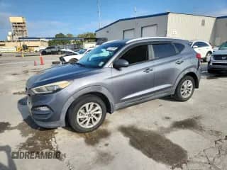 2016 Hyundai Tucson SE with VIN KM8J33A43GU076454, listed as a Copart auction lot 87242295 with 150,674 mi miles and Salvage title. Bid and sale history available at DreamBid. Image 1.