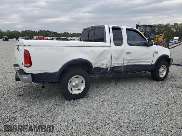 ✅ 2001 Ford F-150 XL • VIN: 1FTRX18L71NA74611 • Лот: 90705765. Опубликован ранее на Copart с пробегом Не указан. Бесплатный доступ к архиву аукционных продаж из США и подробный отчёт об истории автомобиля на DreamBid. Изображение 3.