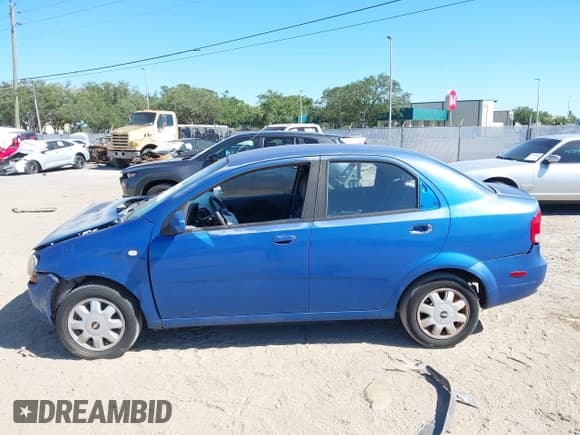 ✅ 2005 Chevrolet Aveo LS • VIN: KL1TD526X5B399695 • Lot: 42048951. Listed on IAAI with 128,466 mi. Free auction sales archive from the USA and detailed vehicle history report at DreamBid. Image 14.