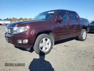 ✅ 2014 Honda Ridgeline RTL • VIN: 5FPYK1F54EB006941 • Lot: 91564495. Listed on Copart with 122,731 mi. Free auction sales archive from the USA and detailed vehicle history report at DreamBid. Image 1.