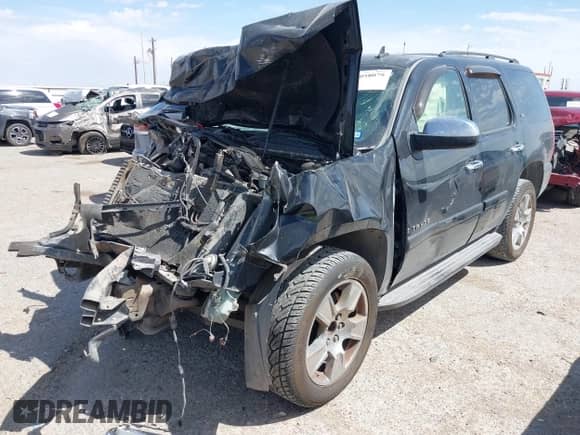 2008 Chevrolet Tahoe 2LT z VIN 1GNFC13JX8R107504, wystawiony jako IAAI lot #42058079 z przebiegiem Nie podano mil oraz . Historia ofert i sprzedaży dostępna na DreamBid. Obrazek 2.