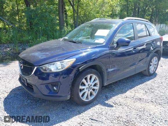 ✅ 2014 Mazda CX-5 Grand Touring • VIN: JM3KE2DY5E0373572 • Лот: 42812084. Опубликован ранее на IAAI с пробегом 88 339 миль. Бесплатный доступ к архиву аукционных продаж из США и подробный отчёт об истории автомобиля на DreamBid. Изображение 2.