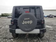 ✅ 2011 Jeep Wrangler Sahara • VIN: 1J4AA5D16BL517963 • Lot: 69210635. Listed on Copart with 171,839 mi. Free auction sales archive from the USA and detailed vehicle history report at DreamBid. Image 6.