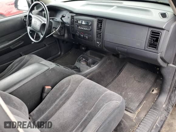 2003 Dodge Dakota z VIN 1D7HL12X83S102980, wystawiony jako Copart lot #72816614 z przebiegiem 138 422 mil mil oraz Czysty tytuł • Clean title. Historia ofert i sprzedaży dostępna na DreamBid. Obrazek 8.