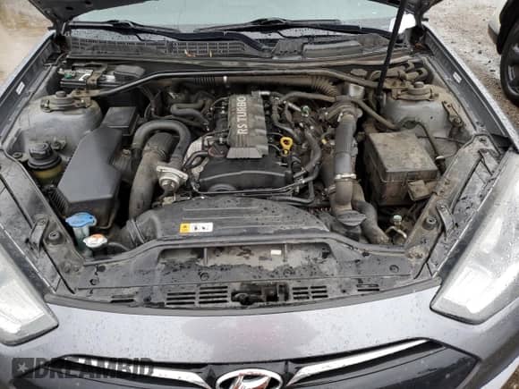 2014 Hyundai Genesis Coupe R-Spec z VIN KMHHT6KD2EU115613, wystawiony jako Copart lot #48880845 z przebiegiem 112 257 mil mil oraz Czysty tytuł • Clean title. Historia ofert i sprzedaży dostępna na DreamBid. Obrazek 11.