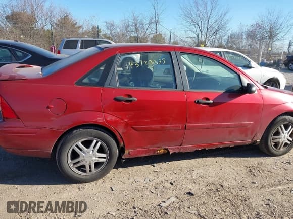 ✅ 2001 Ford Focus SE • VIN: 1FAFP34321W220918 • Lot: 43723399. Listed on IAAI with 86,976 mi. Free auction sales archive from the USA and detailed vehicle history report at DreamBid. Image 6.
