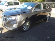 ✅ 2021 Chevrolet Equinox LT • VIN: 2GNAXJEVXM6151801 • Lot: 43462120. Listed on IAAI with 99,944 mi. Free auction sales archive from the USA and detailed vehicle history report at DreamBid. Image 2.