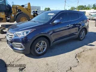 2018 Hyundai Santa Fe 2.4L z VIN 5XYZTDLB8JG546804, wystawiony jako Copart lot #70115275 z przebiegiem 141 974 mil mil oraz Czysty tytuł • Clean title. Historia ofert i sprzedaży dostępna na DreamBid. Obrazek 1.