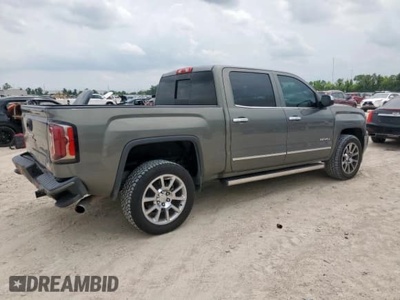 ✅ 2018 GMC Sierra 1500 Denali • VIN: 3GTU2PEC8JG598522 • Лот: 58838995. Опубликован ранее на Copart с пробегом 84 019 миль. Бесплатный доступ к архиву аукционных продаж из США и подробный отчёт об истории автомобиля на DreamBid. Изображение 3.