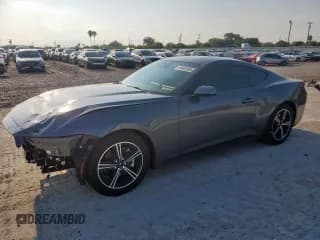 ✅ 2025 Ford Mustang EcoBoost • VIN: 1FA6P8TH5S5121950 • Lot: 69849265. Listed on Copart with 1,023 mi. Free auction sales archive from the USA and detailed vehicle history report at DreamBid. Image 1.