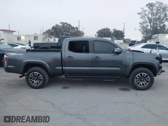 ✅ 2023 Toyota Tacoma SR5 • VIN: 3TMBZ5DN3PM038380 • Lot: 43543877. Listed on IAAI with 22,417 mi. Free auction sales archive from the USA and detailed vehicle history report at DreamBid. Image 13.