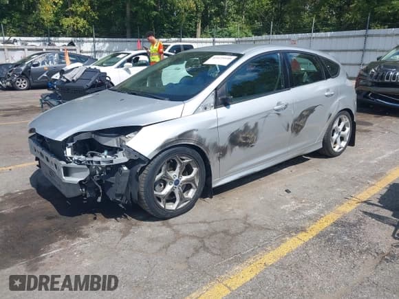 ✅ 2014 Ford Focus ST • VIN: 1FADP3L94EL365639 • Lot: 43125440. Listed on IAAI with 64,256 mi. Free auction sales archive from the USA and detailed vehicle history report at DreamBid. Image 2.