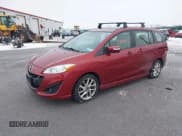 ✅ 2013 Mazda 5 Grand Touring • VIN: JM1CW2DL0D0159358 • Лот: 43814485. Опубликован ранее на IAAI с пробегом 131 152 миль. Бесплатный доступ к архиву аукционных продаж из США и подробный отчёт об истории автомобиля на DreamBid. Изображение 2.