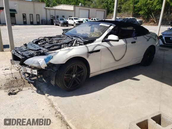 ✅ 2013 BMW 6 Series 650i xDrive • VIN: WBAYP1C55DDX00779 • Lot: 51465294. Wystawiony na Copart z przebiegiem 157 206 mil. Bezpłatny archiwum sprzedaży aukcyjnych z USA i szczegółowy raport historii pojazdu na DreamBid. Zdjęcie 1.