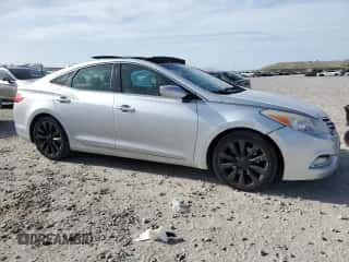 2013 Hyundai Azera с VIN KMHFH4JG1DA230244, выставлен на аукционе Copart как лот 51990655 с пробегом 150 607 миль миль и Списание • Salvage title. История ставок и продаж доступна на DreamBid. Изображение 4.