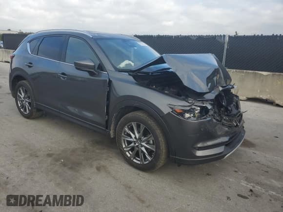 ✅ 2019 Mazda CX-5 Signature • VIN: JM3KFBEY1K0561402 • Lot: 87389335. Wystawiony na Copart z przebiegiem 77 190 mil. Bezpłatny archiwum sprzedaży aukcyjnych z USA i szczegółowy raport historii pojazdu na DreamBid. Zdjęcie 4.