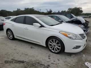 2013 Hyundai Azera с VIN KMHFH4JG7DA232922, выставлен на аукционе Copart как лот 88146315 с пробегом 156 128 миль миль и Чистый • Clean title. История ставок и продаж доступна на DreamBid. Изображение 4.