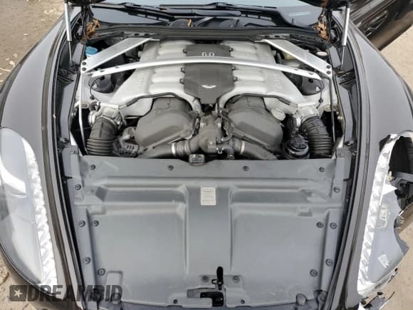 ✅ 2012 Aston Martin Rapide • VIN: SCFHDDAJ5CGF03173 • Lot: 73395112. Wystawiony na Copart z przebiegiem 27 329 mil. Bezpłatny archiwum sprzedaży aukcyjnych z USA i szczegółowy raport historii pojazdu na DreamBid. Zdjęcie 11.