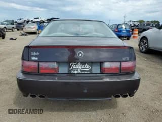 ✅ 1992 Cadillac Seville • VIN: 1G6KY53BXNU804126 • Lot: 69219394. Wystawiony na Copart z przebiegiem 100 647 mil. Bezpłatny archiwum sprzedaży aukcyjnych z USA i szczegółowy raport historii pojazdu na DreamBid. Zdjęcie 6.