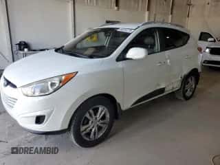 2011 Hyundai Tucson GLS with VIN KM8JU3AC0BU128555, listed as a Copart auction lot 86261275 with 177,820 mi miles and Salvage title. Bid and sale history available at DreamBid. Image 1.