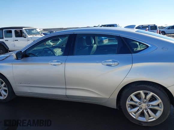 ✅ 2018 Chevrolet Impala LT • VIN: 2G1105S38J9172642 • Lot: 43617684. Wystawiony na IAAI z przebiegiem 198 638 mil. Bezpłatny archiwum sprzedaży aukcyjnych z USA i szczegółowy raport historii pojazdu na DreamBid. Zdjęcie 14.