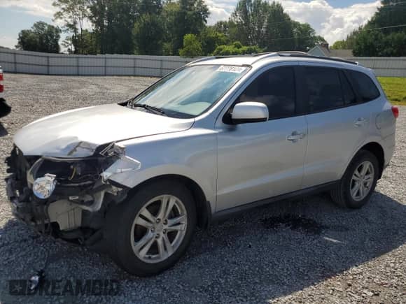 2012 Hyundai Santa Fe SE z VIN 5XYZH4AG0CG097914, wystawiony jako Copart lot #67776104 z przebiegiem 166 992 mil mil oraz Szkoda całkowita • Salvage title. Historia ofert i sprzedaży dostępna na DreamBid. Obrazek 1.