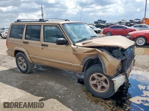 ✅ 1999 Jeep Cherokee Sport • VIN: 1J4FT68S8XL505703 • Lot: 68164535. Listed on Copart with 195,074 mi. Free auction sales archive from the USA and detailed vehicle history report at DreamBid. Image 4.