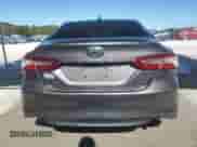 2020 Toyota Camry LE with VIN 4T1C11AK8LU320868, listed as a Copart auction lot 67942255 with 119,976 mi miles and Salvage title. Bid and sale history available at DreamBid. Image 6.