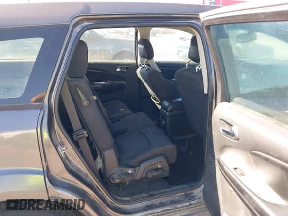 2015 Dodge Journey American Value z VIN 3C4PDCAB7FT559299, wystawiony jako IAAI lot #43409195 z przebiegiem 183 905 mil mil oraz . Historia ofert i sprzedaży dostępna na DreamBid. Obrazek 8.