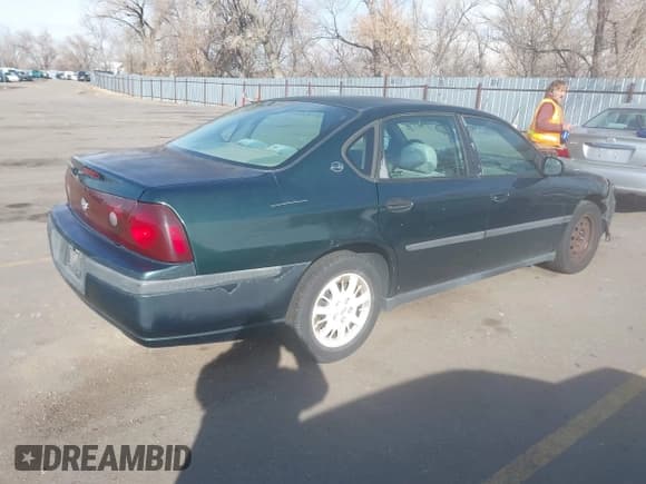 ✅ 2002 Chevrolet Impala • VIN: 2G1WF55E129163672 • Lot: 41305637. Wystawiony na IAAI z przebiegiem 231 272 mil. Bezpłatny archiwum sprzedaży aukcyjnych z USA i szczegółowy raport historii pojazdu na DreamBid. Zdjęcie 4.