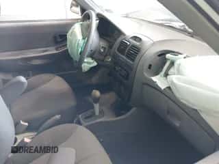 2004 Hyundai Accent GL z VIN KMHCG35C64U306062, wystawiony jako IAAI lot #42685736 z przebiegiem 150 574 mil mil oraz . Historia ofert i sprzedaży dostępna na DreamBid. Obrazek 5.