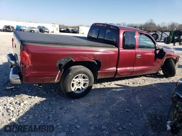 2003 Dodge Dakota SLT with VIN 1D7HL42N23S226033, listed as a Copart auction lot 83297194 with Not provided miles and Salvage title. Bid and sale history available at DreamBid. Image 3.