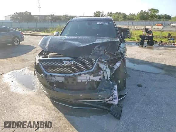 ✅ 2021 Cadillac XT6 Premium Luxury • VIN: 1GYKPCRS7MZ103504 • Lot: 67899385. Listed on Copart with 120,670 mi. Free auction sales archive from the USA and detailed vehicle history report at DreamBid. Image 14.