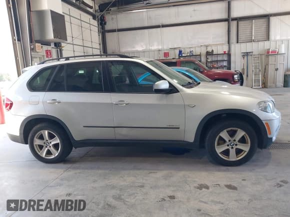✅ 2012 BMW X5 35d • VIN: 5UXZW0C53CL674187 • Lot: 42274931. Listed on IAAI with 272,642 mi. Free auction sales archive from the USA and detailed vehicle history report at DreamBid. Image 13.