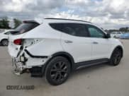 ✅ 2017 Hyundai Santa Fe Ultimate • VIN: 5XYZWDLA4HG435000 • Лот: 71645544. Опубликован ранее на Copart с пробегом 99 328 миль. Бесплатный доступ к архиву аукционных продаж из США и подробный отчёт об истории автомобиля на DreamBid. Изображение 3.