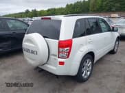 ✅ 2012 Suzuki Grand Vitara Limited • VIN: JS3TD0D70C4101207 • Lot: 42324290. Listed on IAAI with 121,646 mi. Free auction sales archive from the USA and detailed vehicle history report at DreamBid. Image 4.